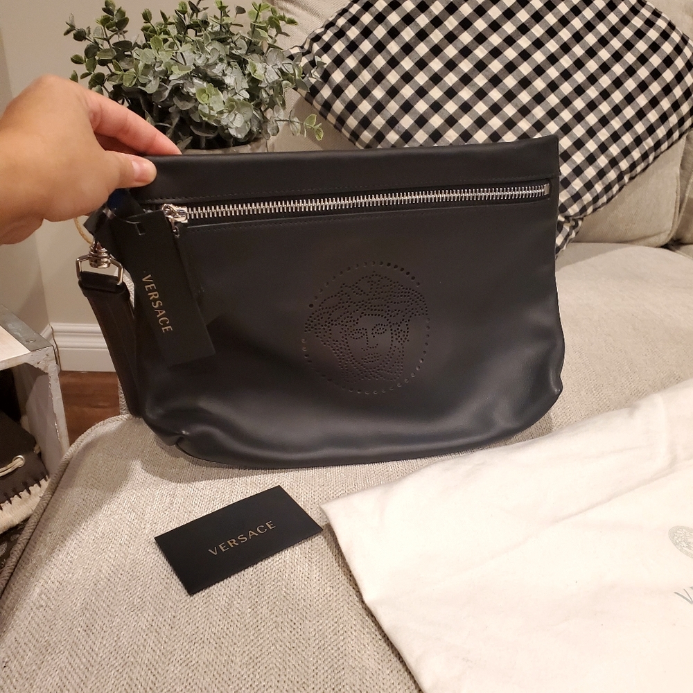 Brand new Versace leather clutch wrislet